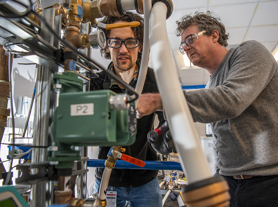 Researchers conduct testing on heat pump water heaters at FLEXLAB®.
