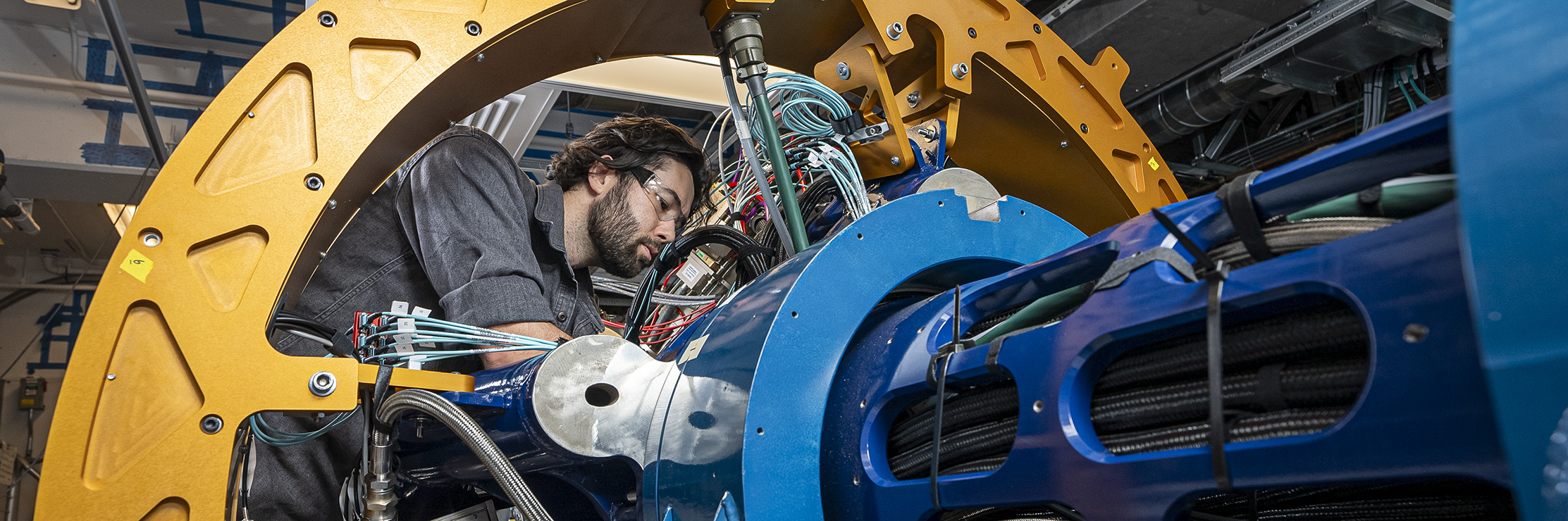 Experts install and test detector components in GRETA.