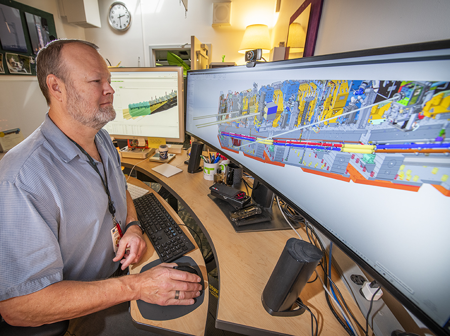 Engineer working in the Computer-Aided Design (CAD) Department.