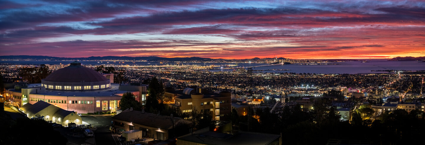 Panoramic view of the lab with a sunset and the San Francisco Bay in the background