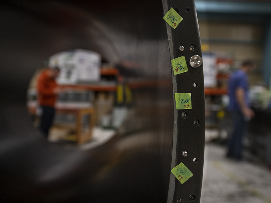 Researchers map the dimensions of the L2 Barrel which will be part of the upgrade on the ATLAS Detector at CERN.