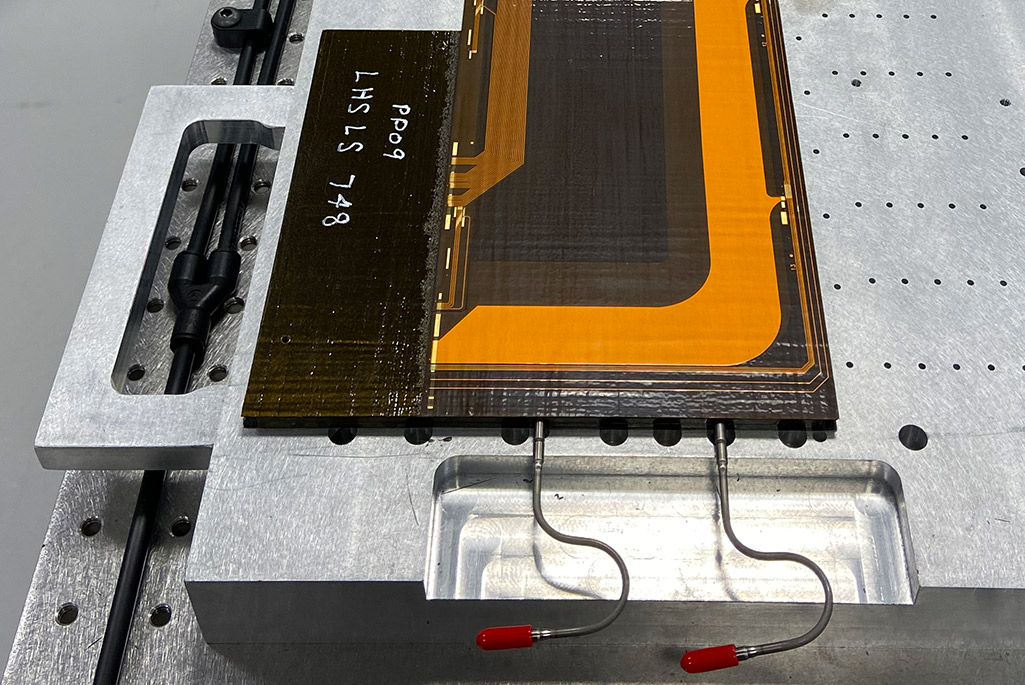 Close-up view of laminated detector component with printed circuit layer