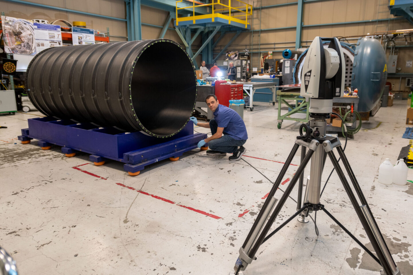 An engineering technician mapping the Layer 2 Barrel dimensions