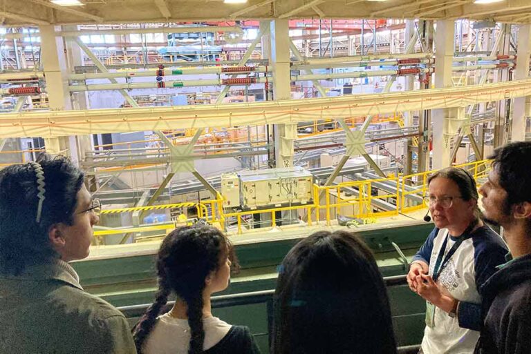 Group of high school students on a guided tour of ALS, led by Ina Reichel