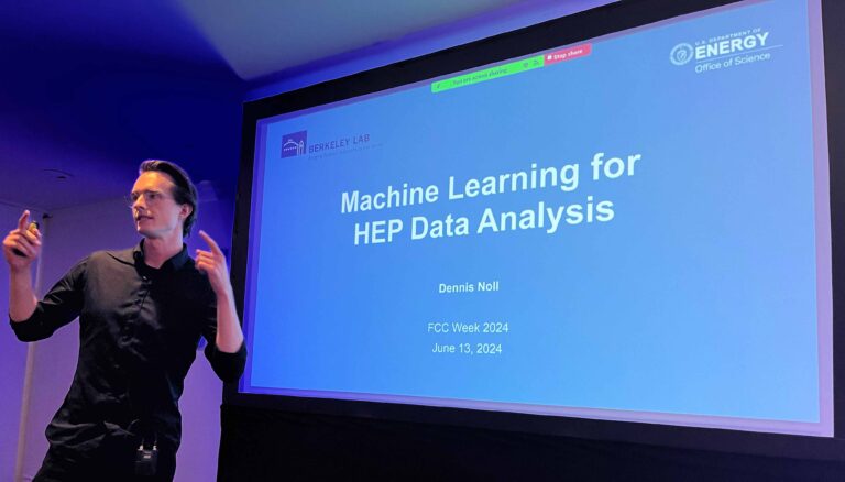 A postdoc doing a presentation on machine learning for HEP data analysis