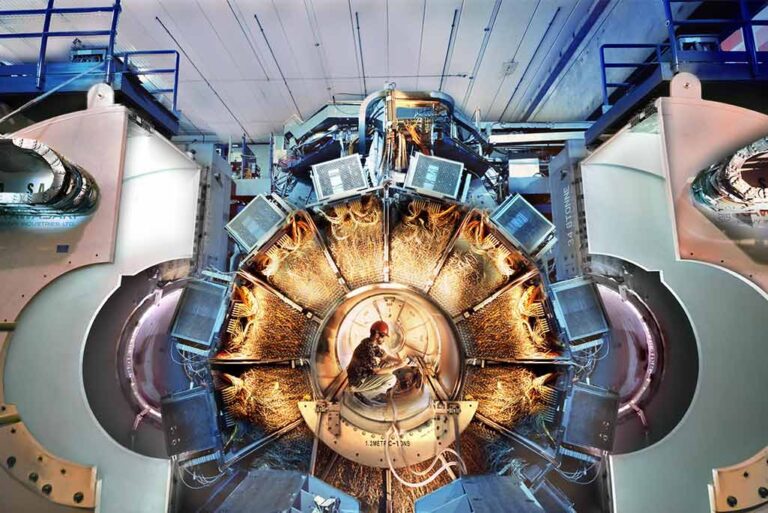 The BaBar Detector at SLAC with a physicist inside wearing a red hard hat