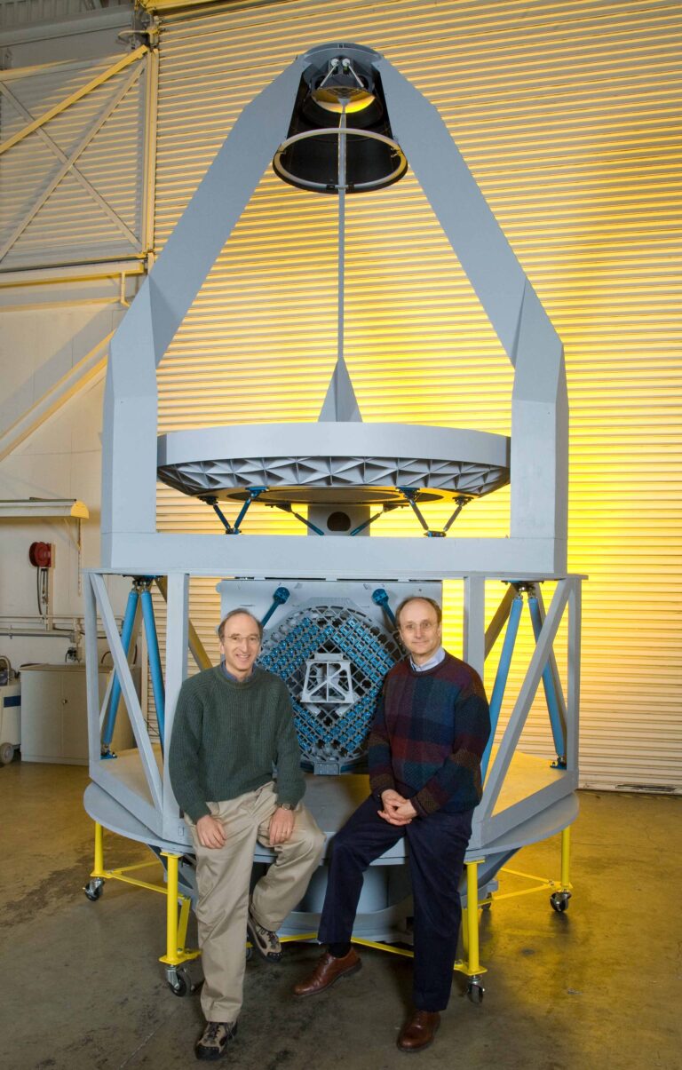 Saul Perlmutter and Michael Levi in front of the full-scale model of SNAP