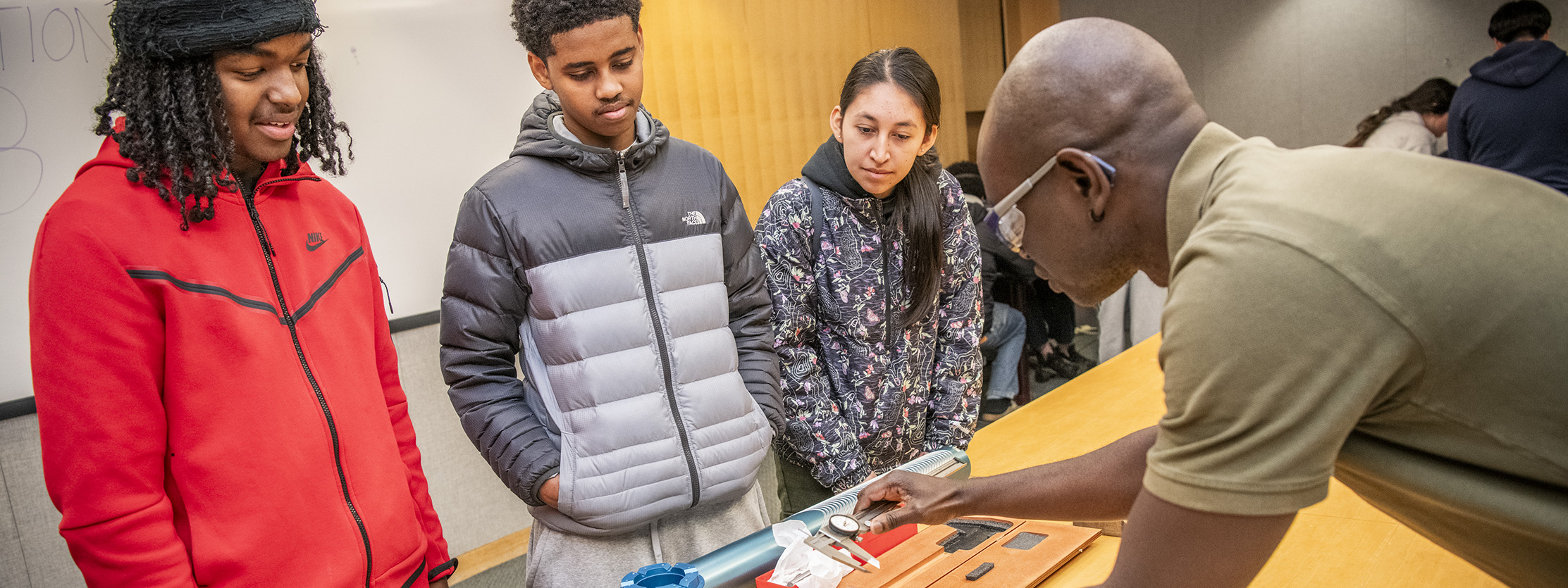 Lab machinist gives presentation at Lawrence Berkeley Lab to Berkeley High School students.