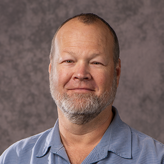 Headshot of James Osborn.