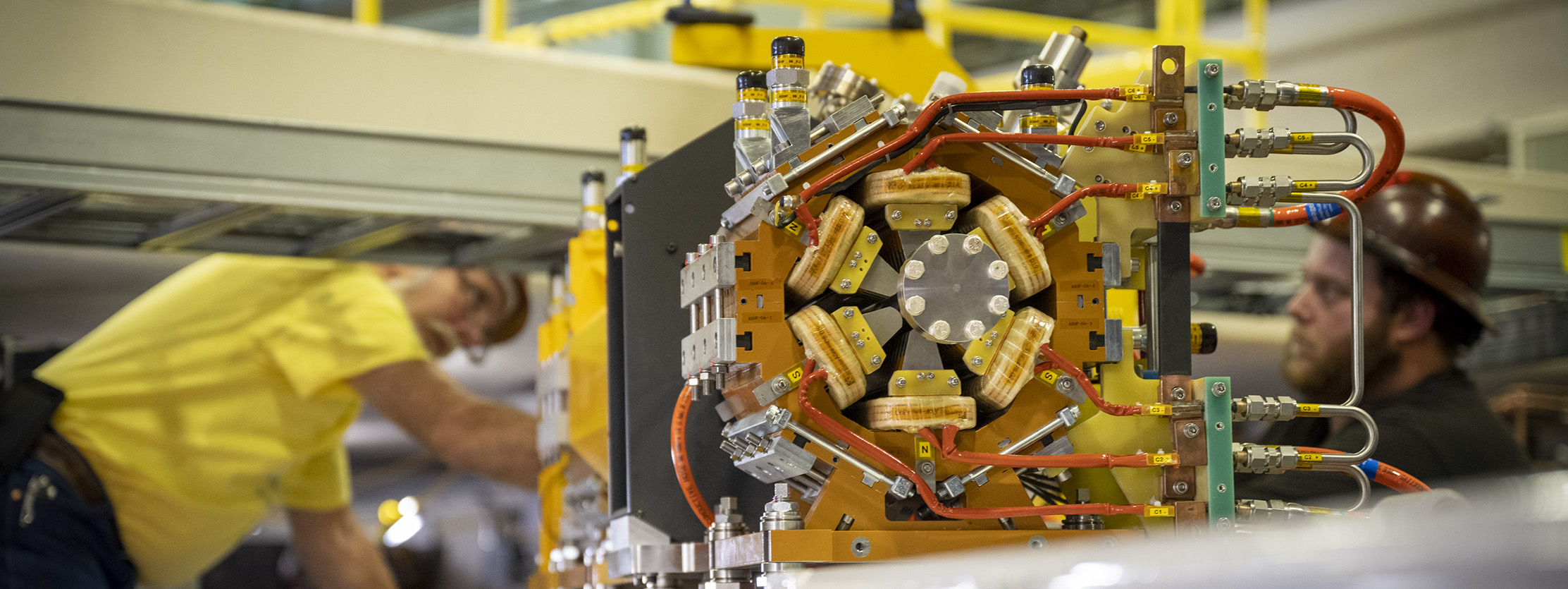 Using a crane to install a raft of magnets at Sector 12, for the Advanced Light Source (ALS) Upgrade project.