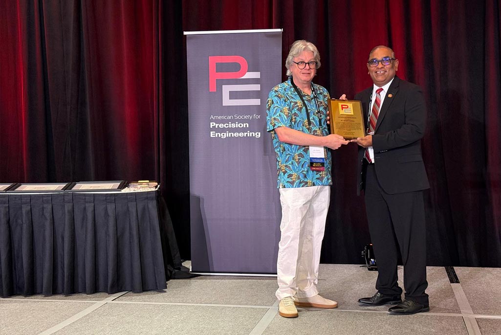 Berkeley Lab Engineer Senajith “Seno” Rekawa (right) accepts the American Society of Precision Engineering (ASPE) 2025 Distinguished Service Award from Stuart Smith, Professor and President of ASPE, at a ceremony held on November 6 in San Diego, California.