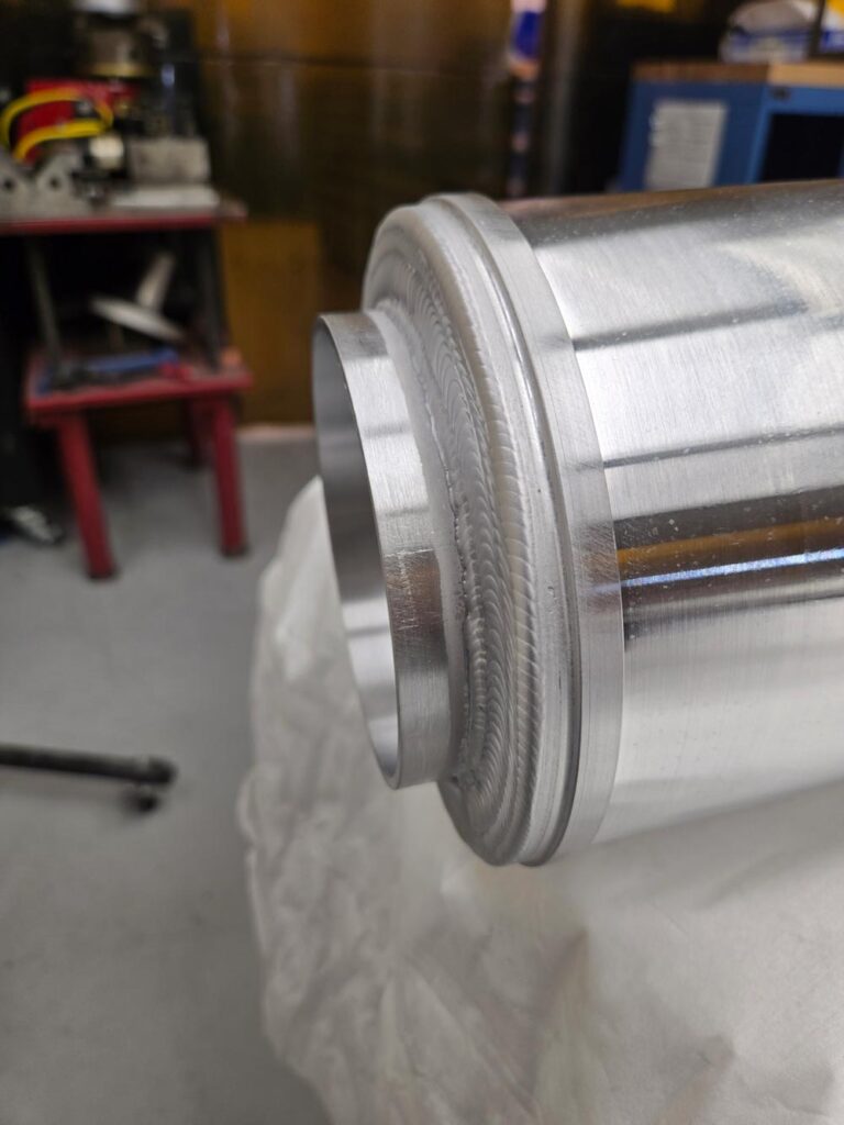 A detail of welding on the VENUS plasma chamber. 