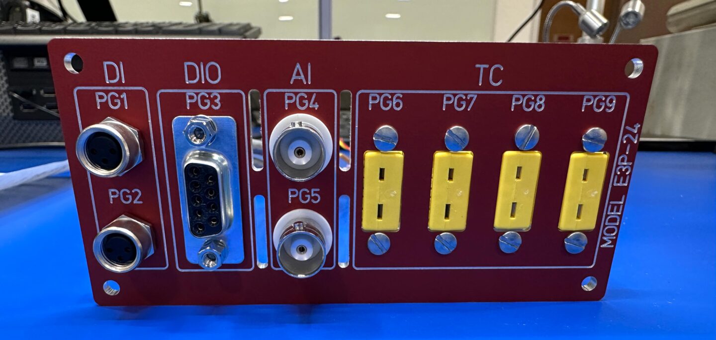 A portion of the face plate for the equipment protection interlock system. Slotted cutouts were added to increase airflow, helping with heat management.