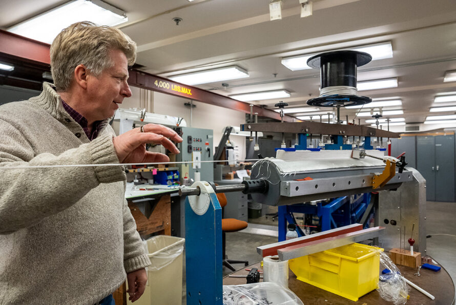 Soren Prestemon looks over the winding tooling design used for the Electron Cyclotron Resonance sextupole magnets.