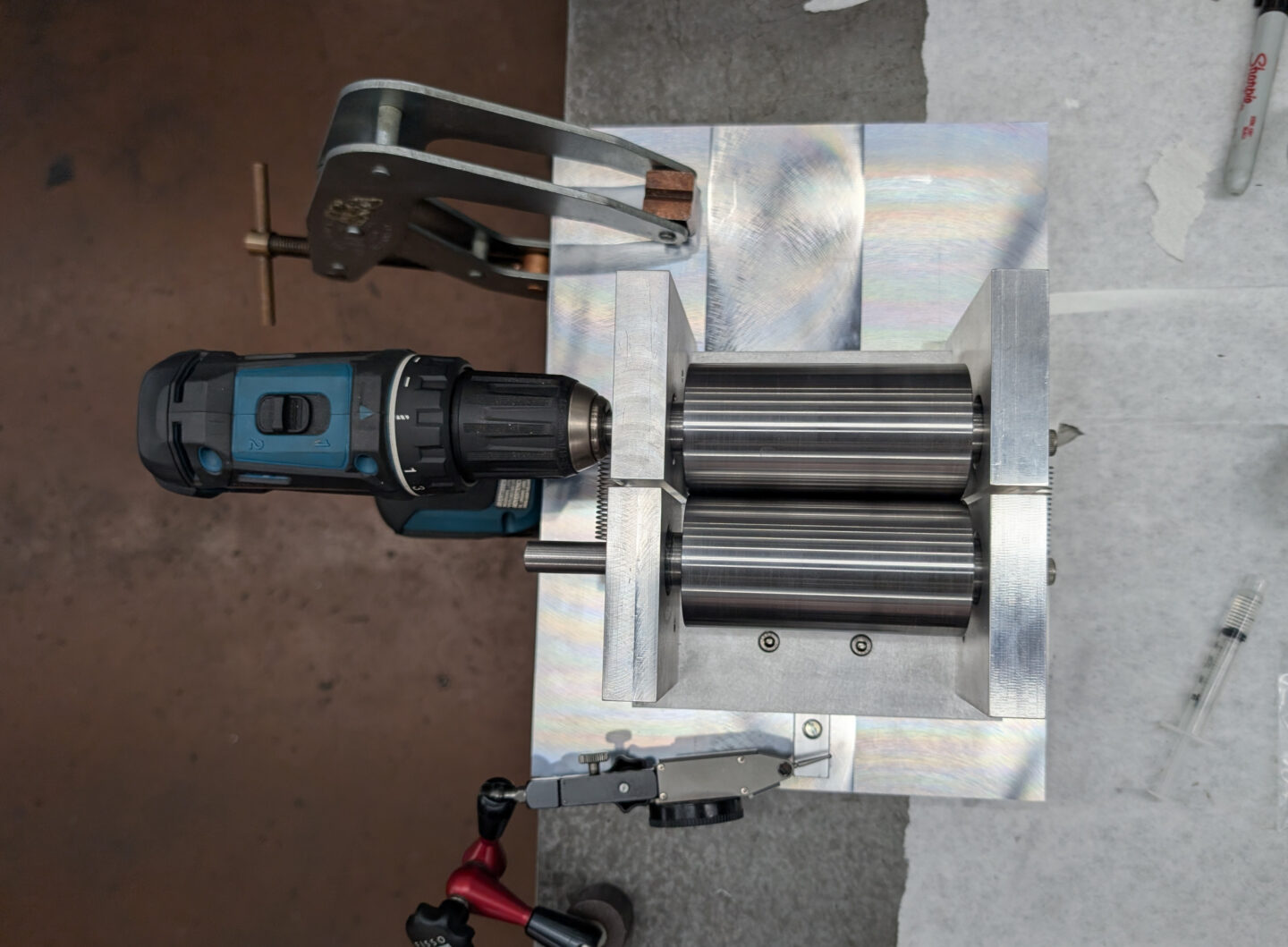 The prototype twin roller quencher, powered by a drill motor.