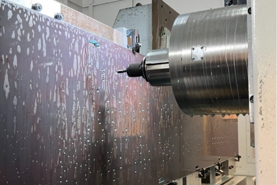 Berkeley Lab’s new computer numerical control machine tapping into a large steel plate that will be used to test the integration of ALS-U vacuum systems and accelerator magnets.